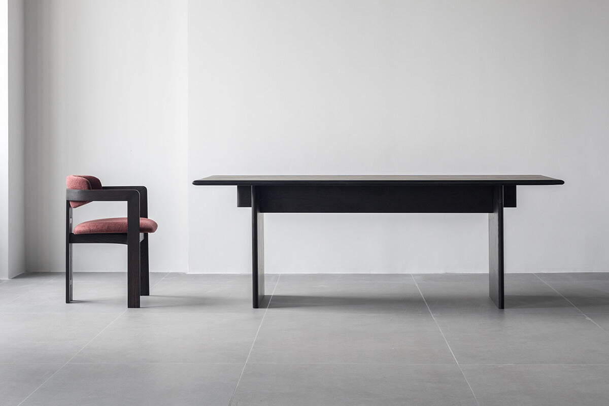 Jutti Dining Table with matching dining chairs in black timber finish