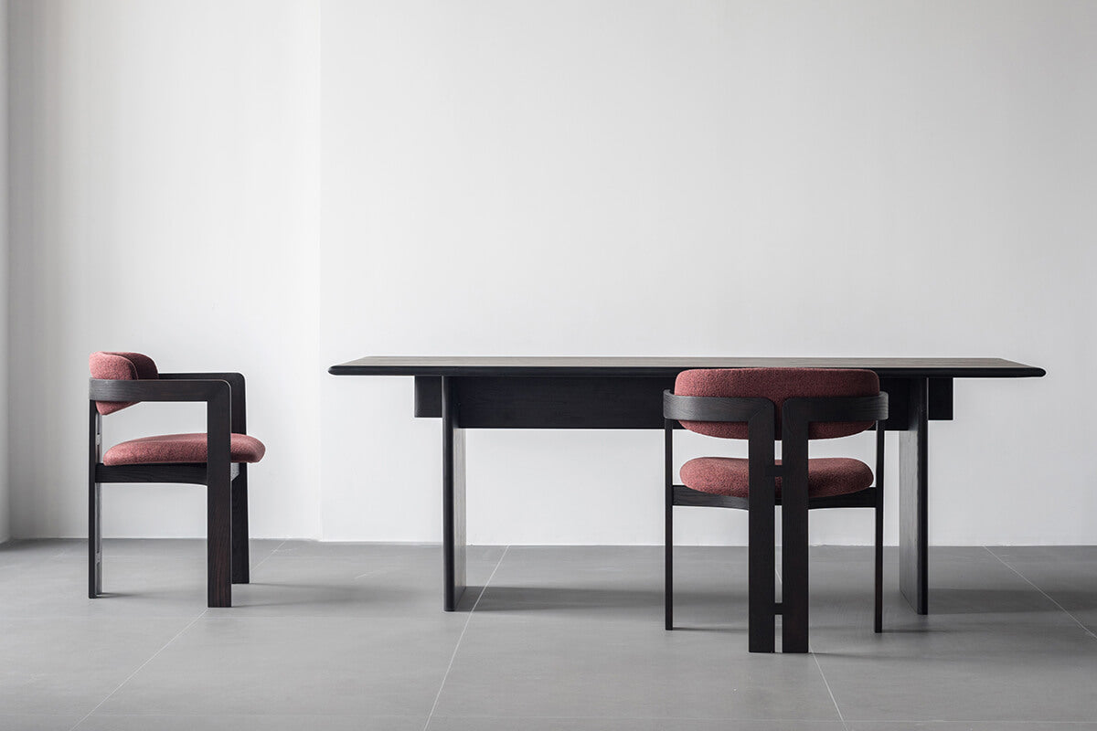 Jutti Dining Table with matching dining chairs in black timber finish