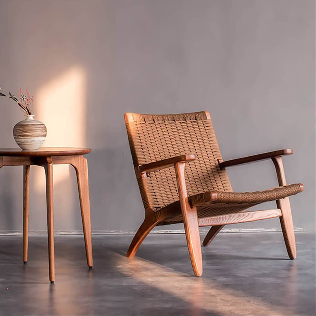 Kelaos armchair with dark wood finish and handwoven rope seat