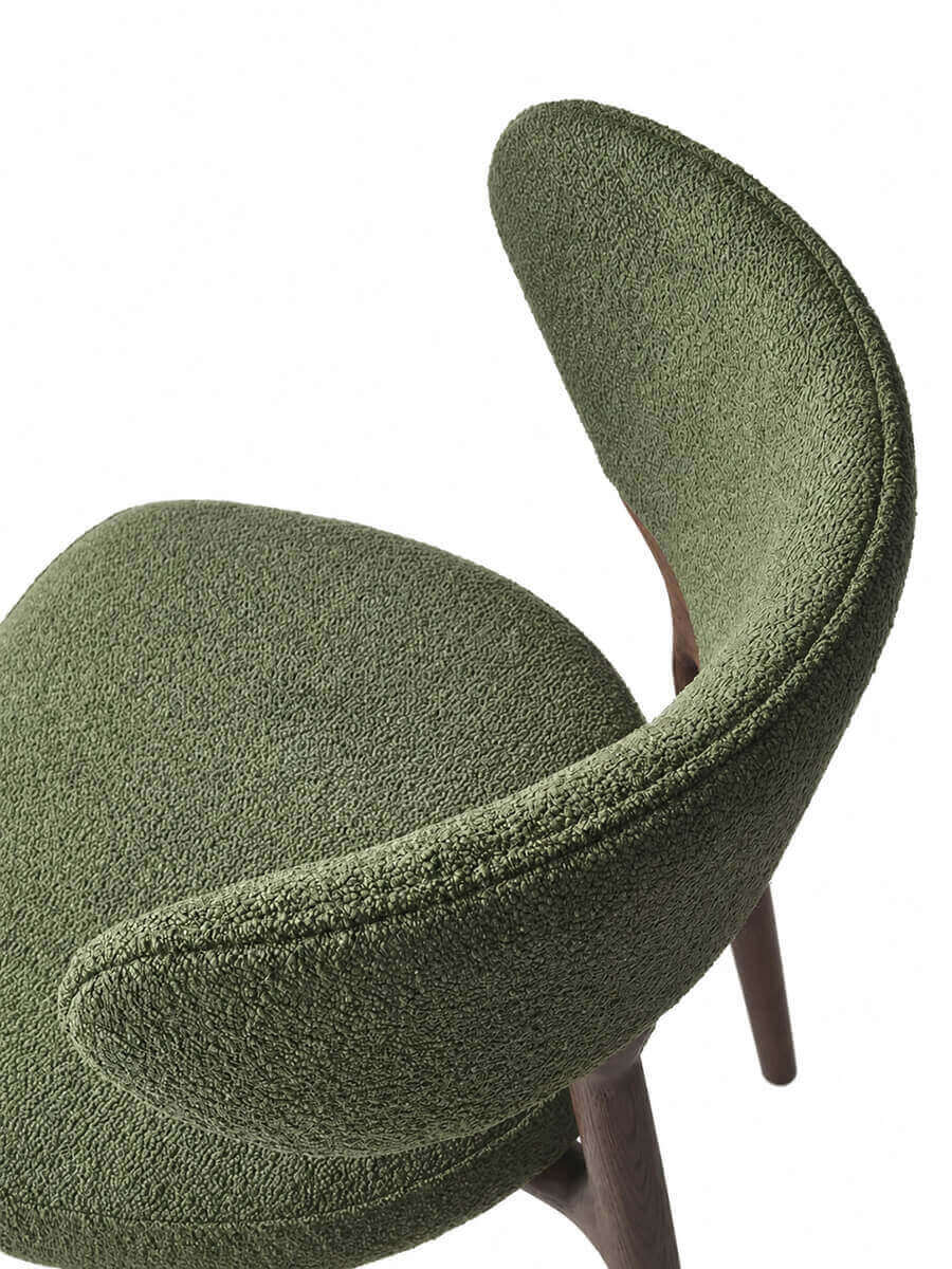 Curved back detail of Klara dining chair