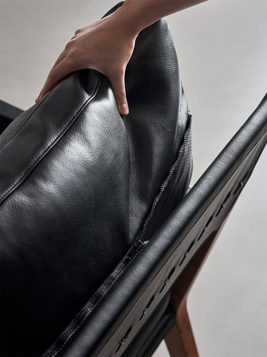 Full-grain leather cushion detail on Lars Solid Walnut Armchair