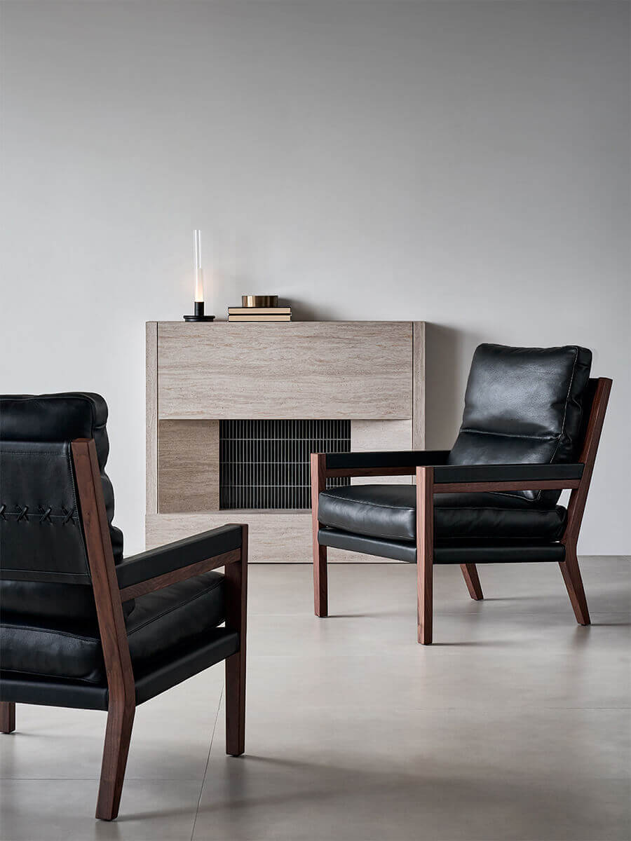 Pair of Lars Solid Walnut Leather Armchairs in contemporary interior