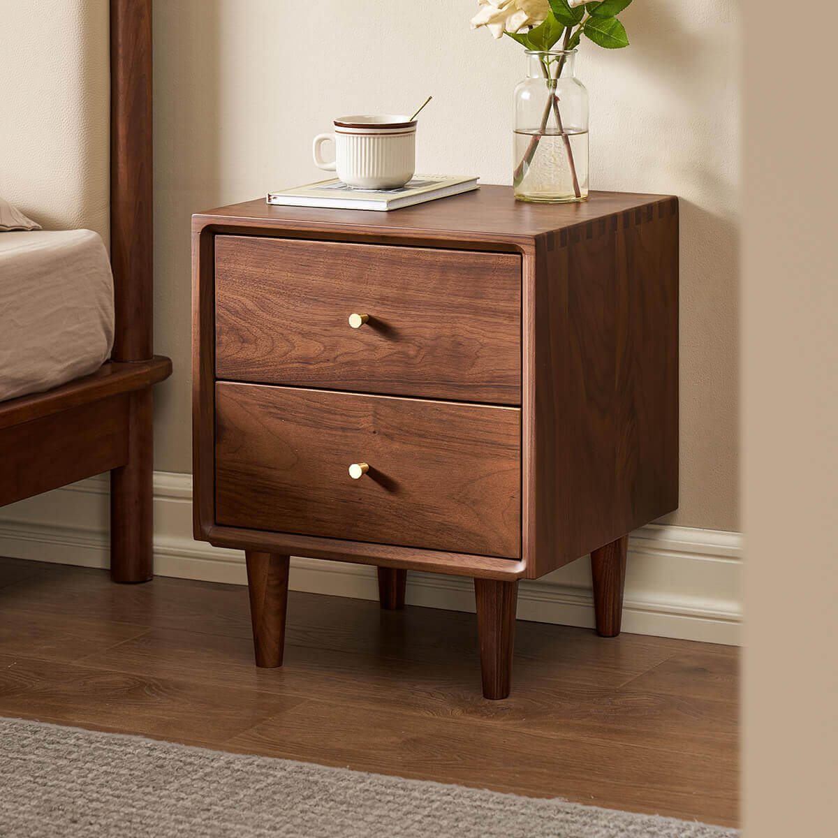 Linde solid walnut bedside table in a contemporary bedroom