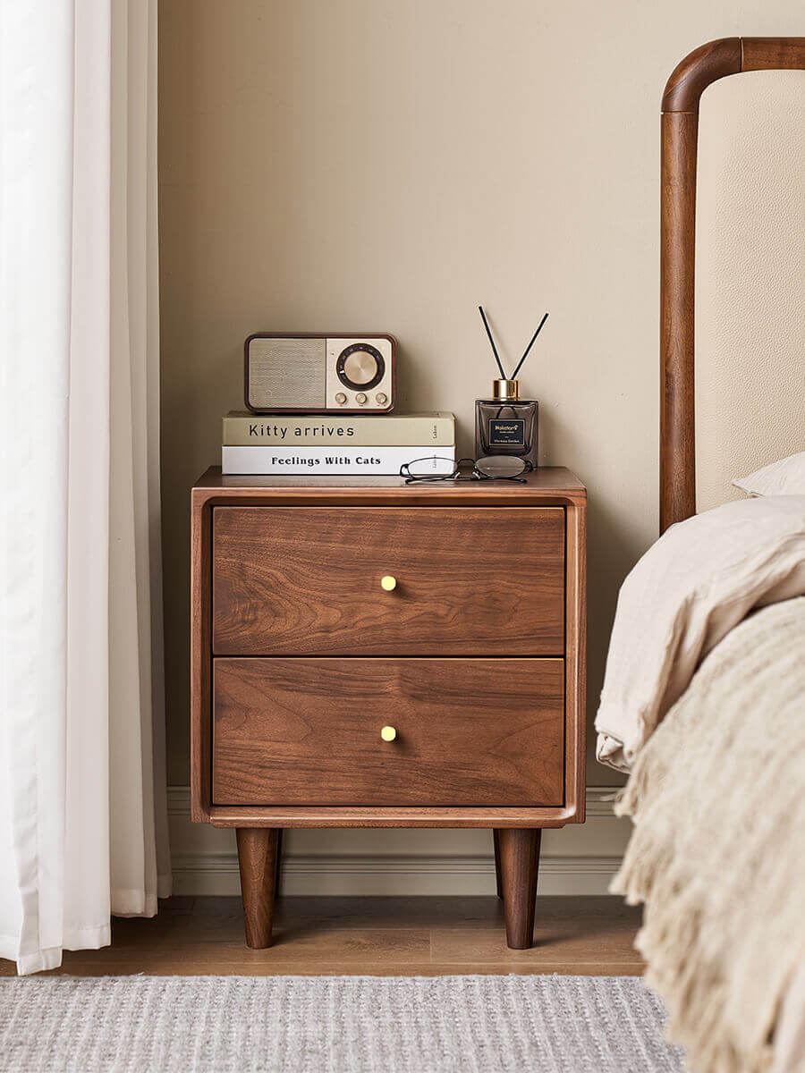 Linde solid walnut bedside table styled in a modern bedroom