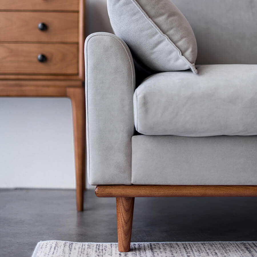 Image of a sofa armrest and leg