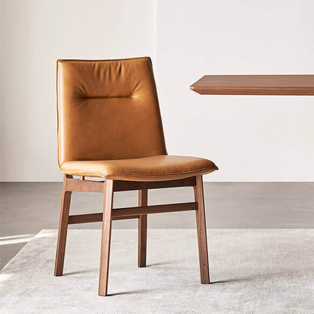 Loren Leather Dining Chair in caramel full leather with solid walnut frame
