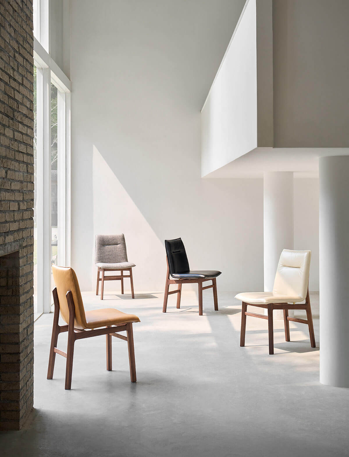 Loren Leather Dining Chairs styled in a contemporary dining room