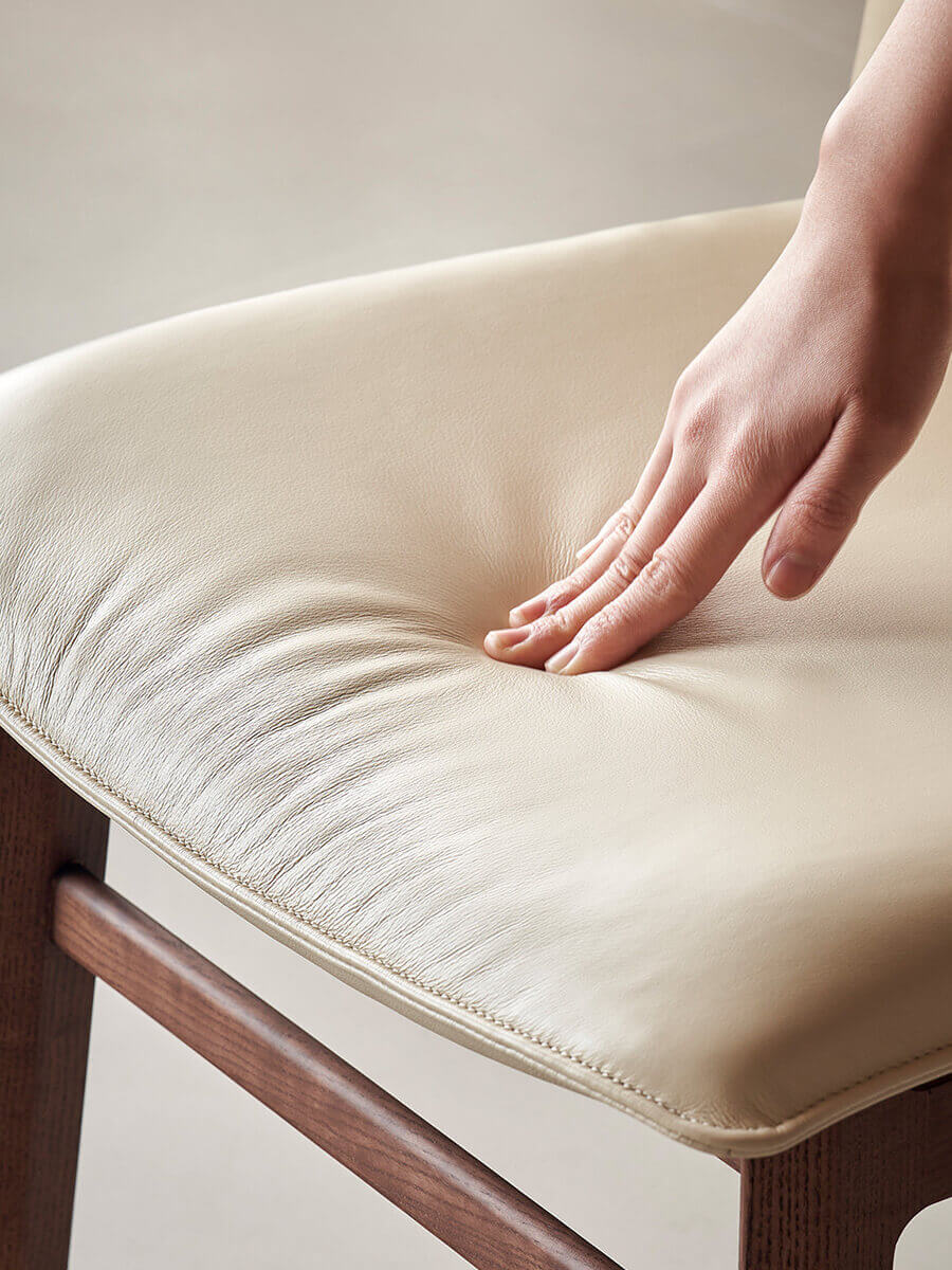 High-density foam seat cushion of the Loren Leather Dining Chair