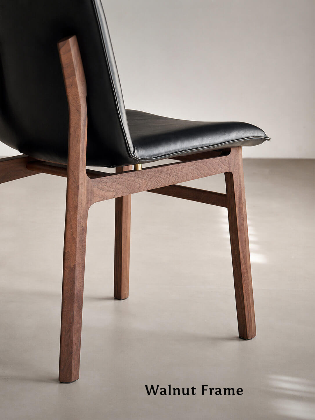 Solid American walnut frame of the Loren Leather Dining Chair