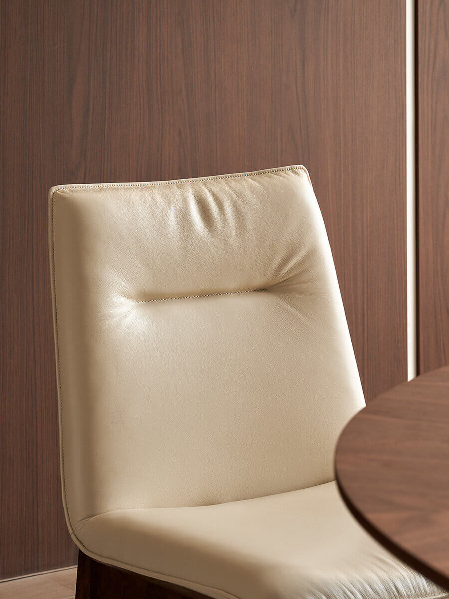 Close-up of the white Loren Leather Dining Chair