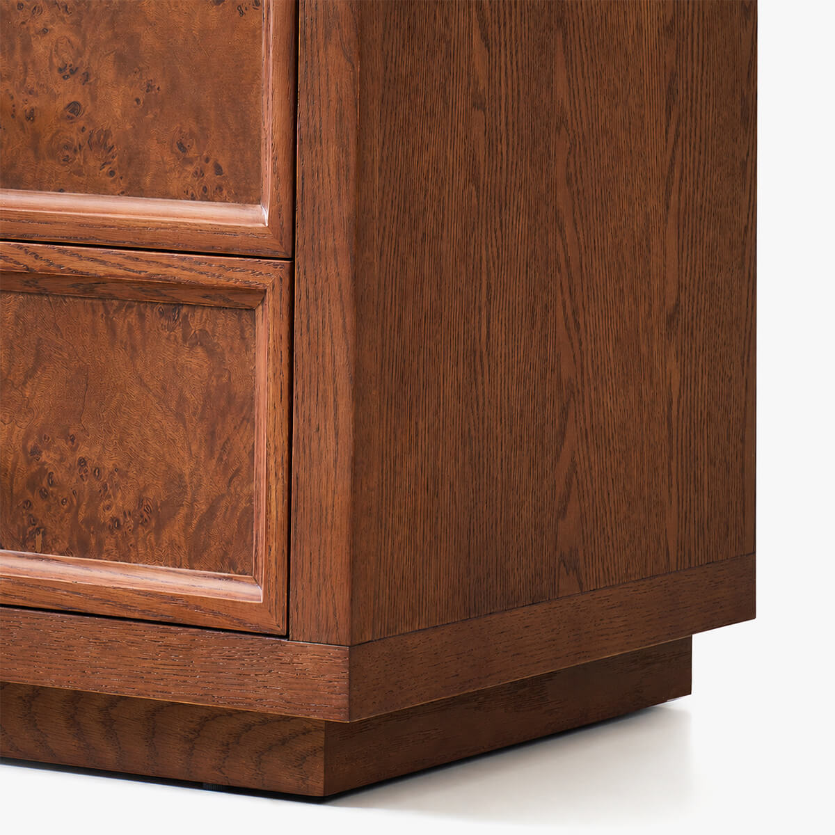 Side view of Louvre burl wood chest of drawers with solid oak frame