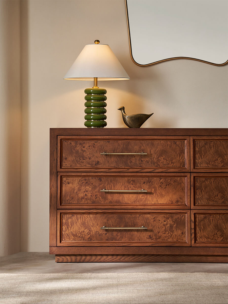 Louvre burl wood six-drawer chest of drawers in a living room
