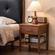 Luca Solid Walnut Bedside Table in a modern bedroom