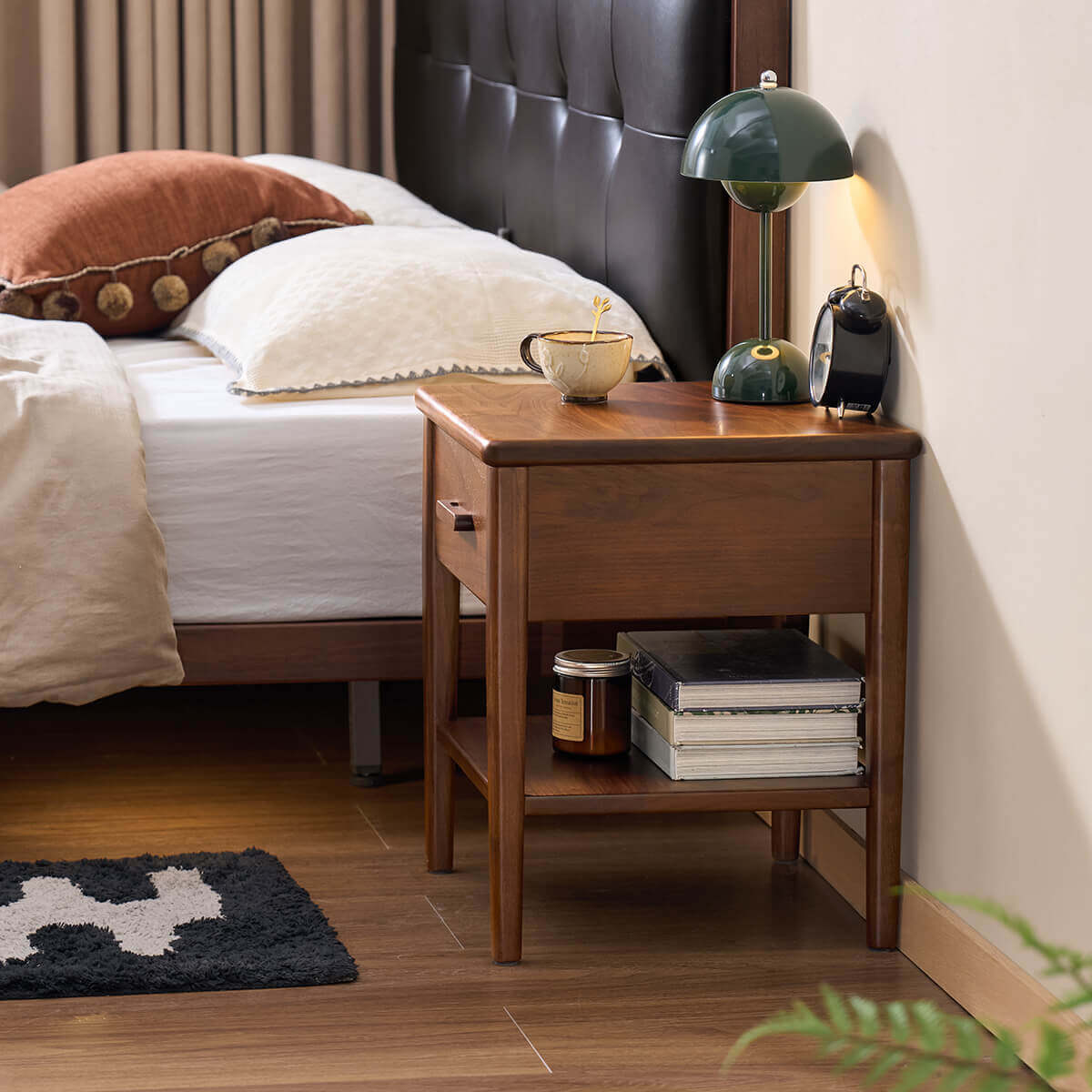 Luca Solid Walnut Bedside Table in a contemporary bedroom