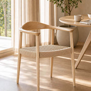 Lund Scandinavian dining chair with handwoven paper cord seat and natural ash wood frame
