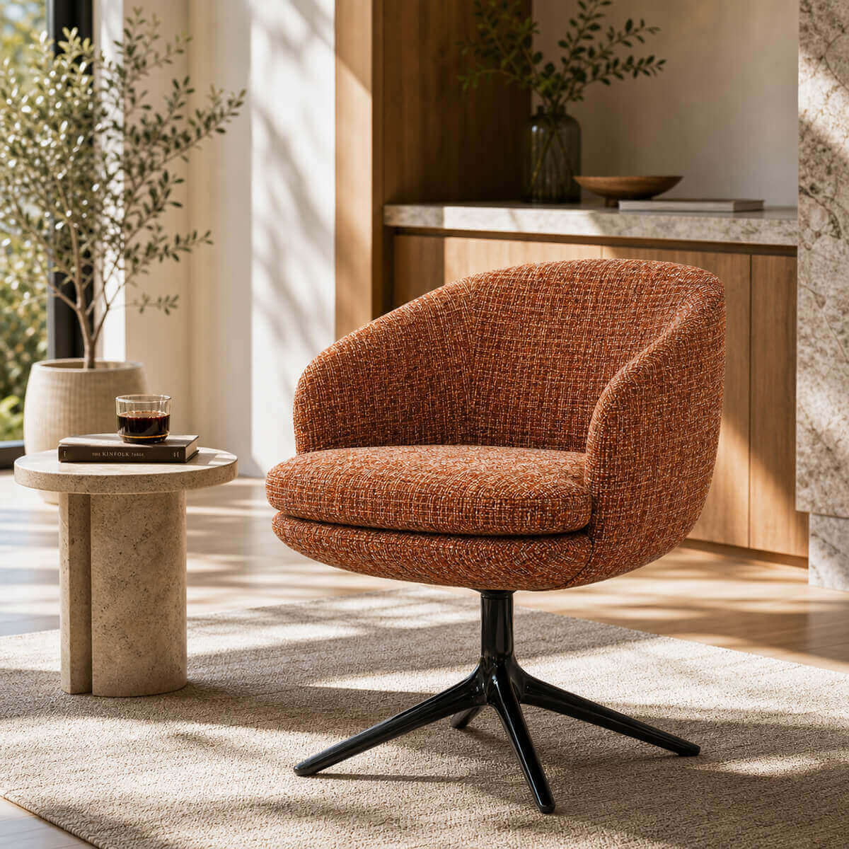 Luno swivel dining armchair in orange textured fabric with black swivel base