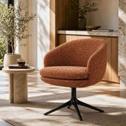 Luno swivel dining armchair in orange textured fabric with black swivel base