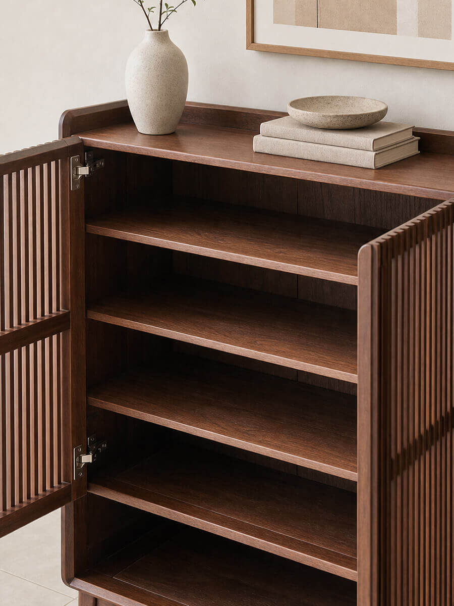 Adjustable shelves inside the Luxemburg solid walnut shoe cabinet