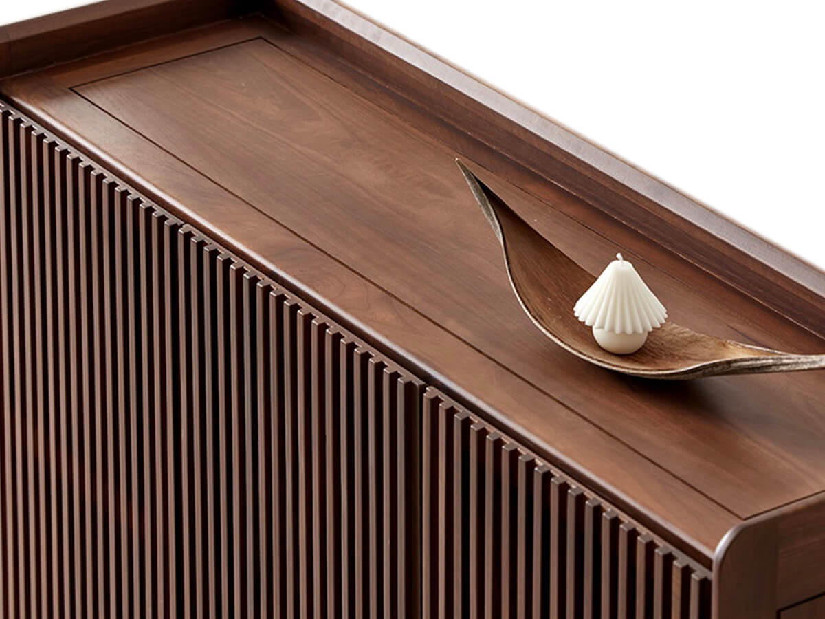 Raised gallery top detail of the Luxemburg solid walnut shoe cabinet