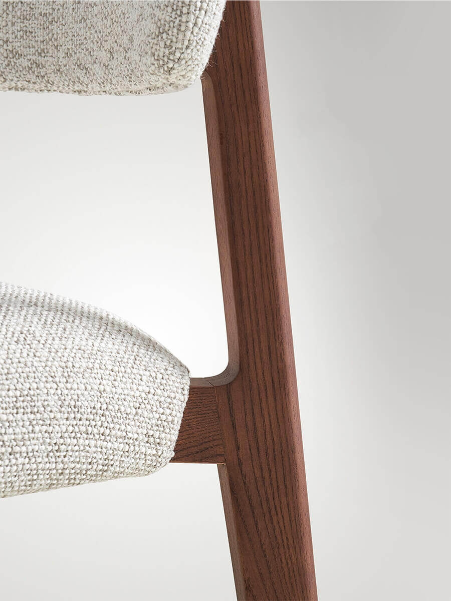Malo fabric dining chair with sculpted solid ash frame