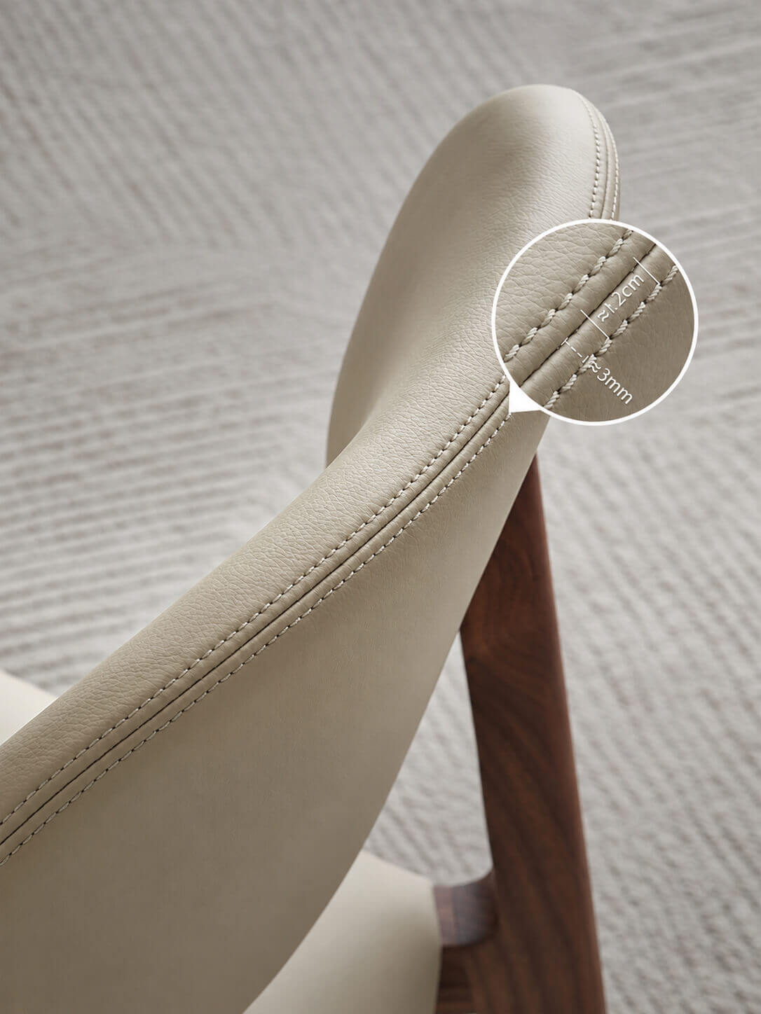 Double-stitch detailing on Malo top-grain leather backrest
