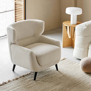 Mandy bouclé fabric armchair with high back design in a contemporary living room