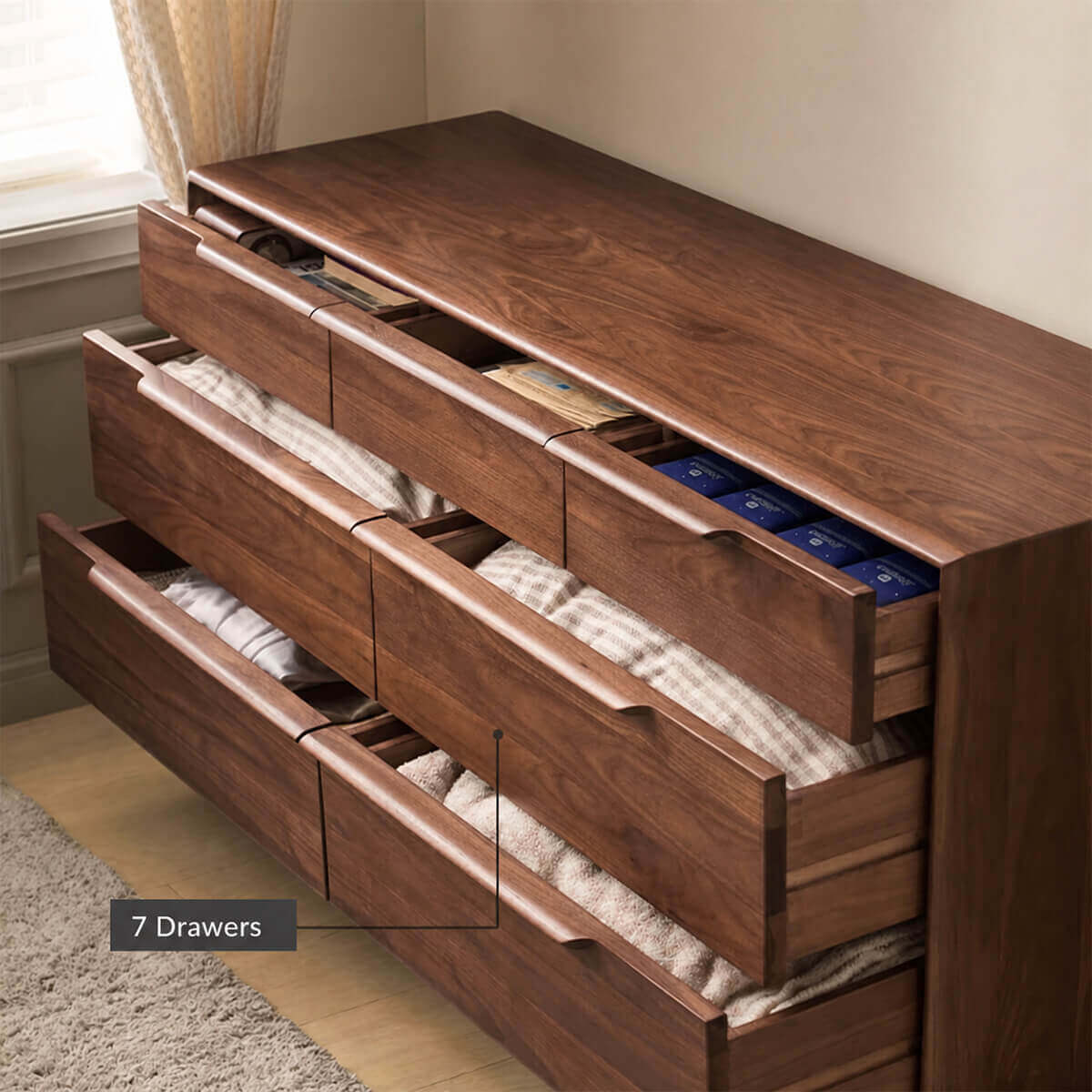 Marcks seven-drawer layout with three smaller and four larger drawers