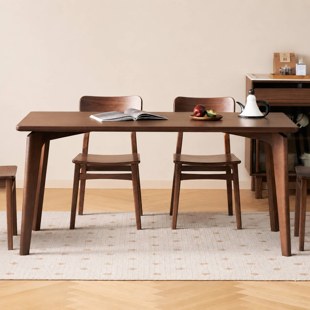 Marcks Solid Walnut Dining Table front view with dining chairs