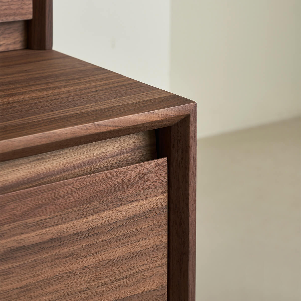 Solid walnut edging detail on the Maury Modular Storage Cabinet