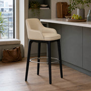 Milo Leather Bar Stool with cream leather upholstery and black frame in modern kitchen