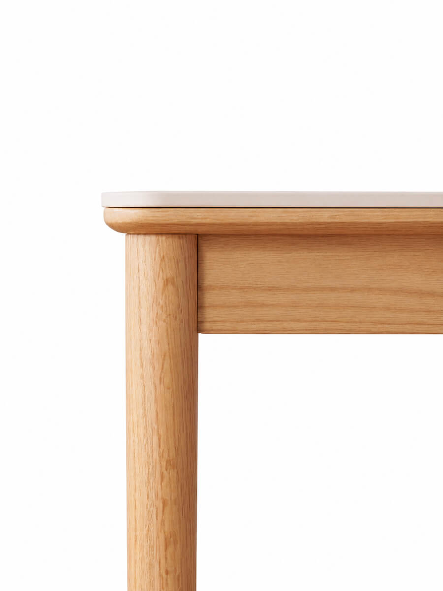 Mora dining table solid oak frame and rounded tabletop corner detail