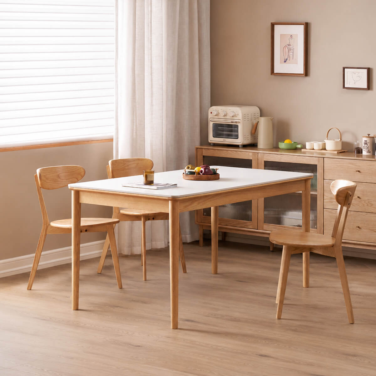 Mora solid oak dining table with white sintered stone top in dining room