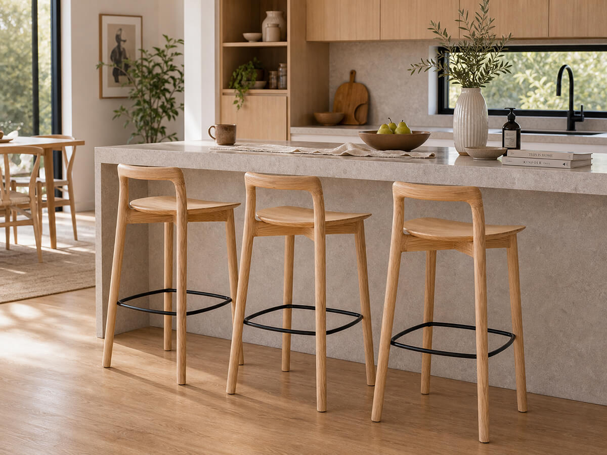 Mountain timber bar stools at a kitchen island in a modern home