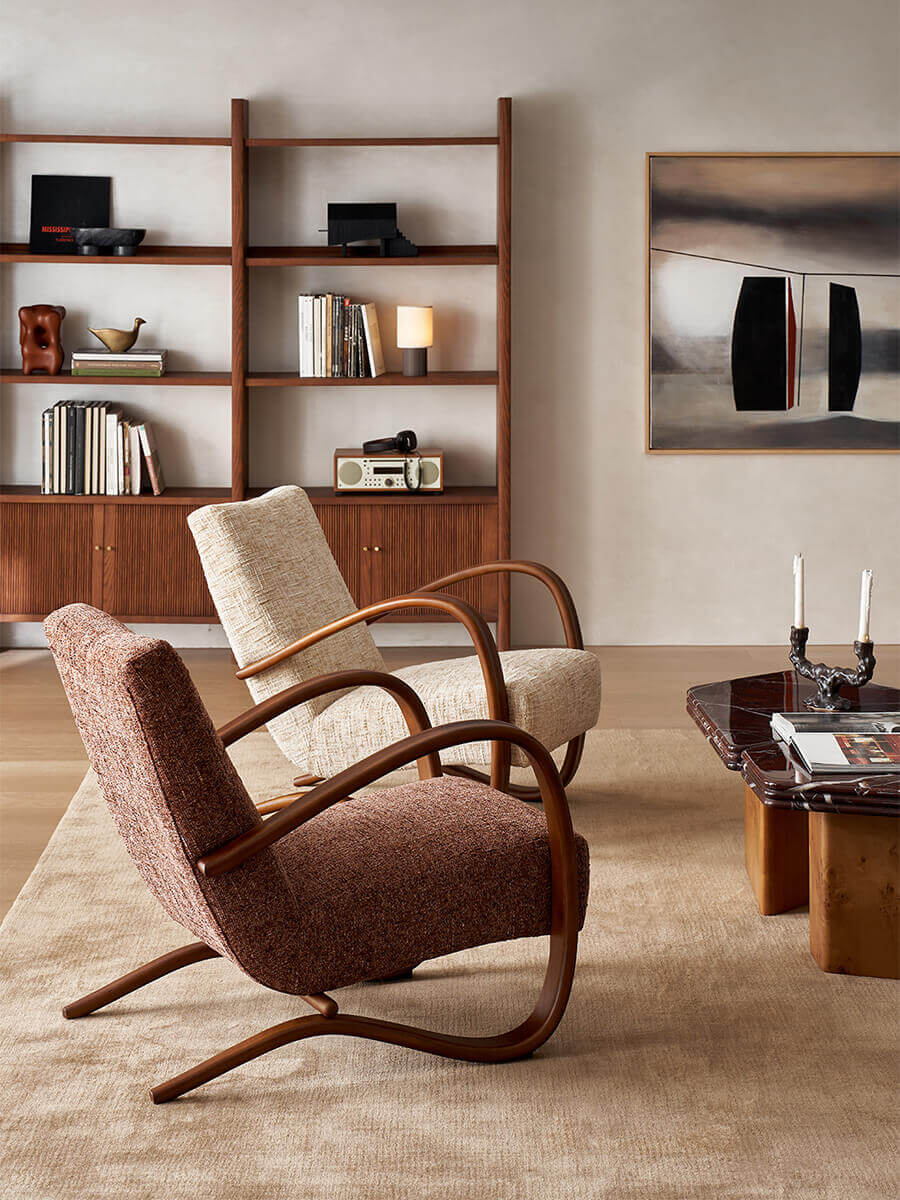 Neva armchair with dark fabric upholstery