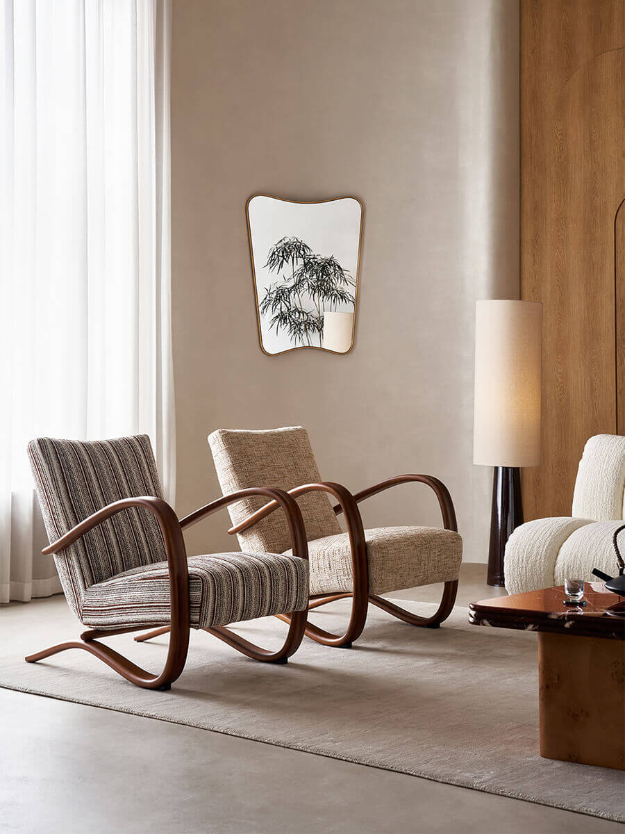 Two Neva armchairs in contemporary interior