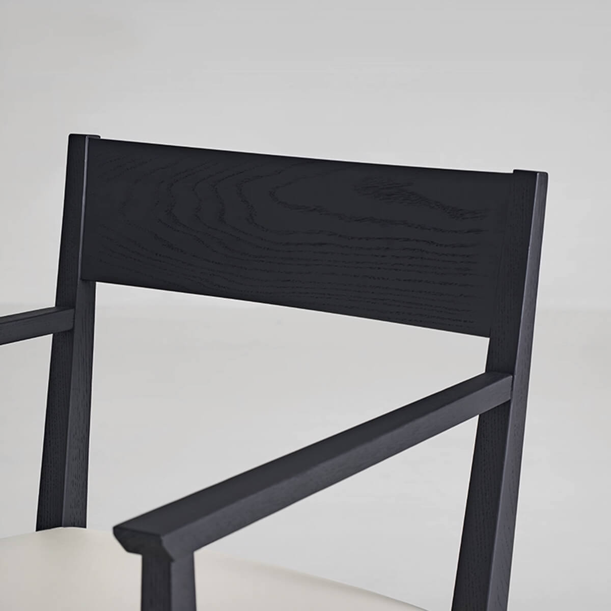 Wooden backrest detail of Noir Dining Chair