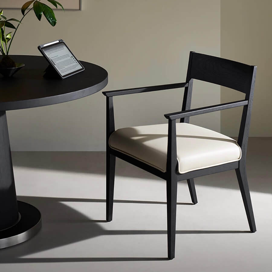 Noir Dining Chair with black wood frame and leather seat