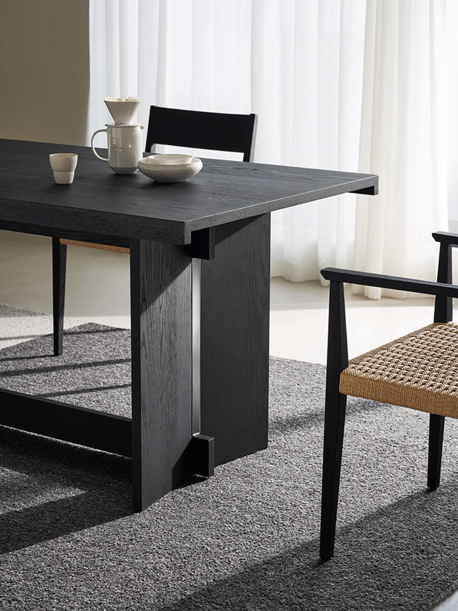Architectural base detail of the Noir Dining Table