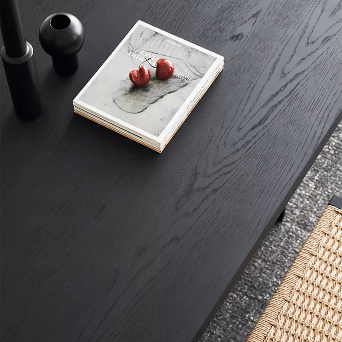 Black oak veneer tabletop detail of the Noir Dining Table