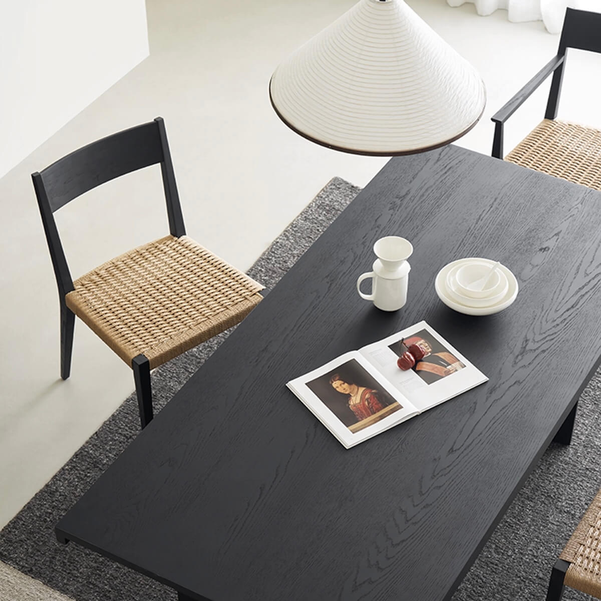 Top view of the Noir Dining Table with black oak veneer finish