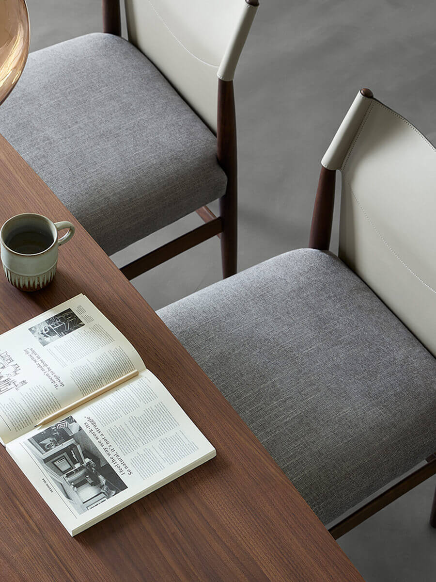 Nora dining chairs styled around a dining table in a contemporary interior