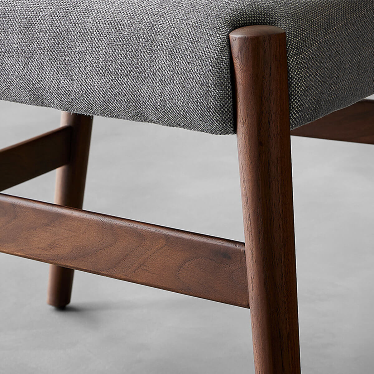 Close-up timber frame detail of Nora dining chair