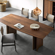 Nora walnut veneer dining table with sculptural pedestal base