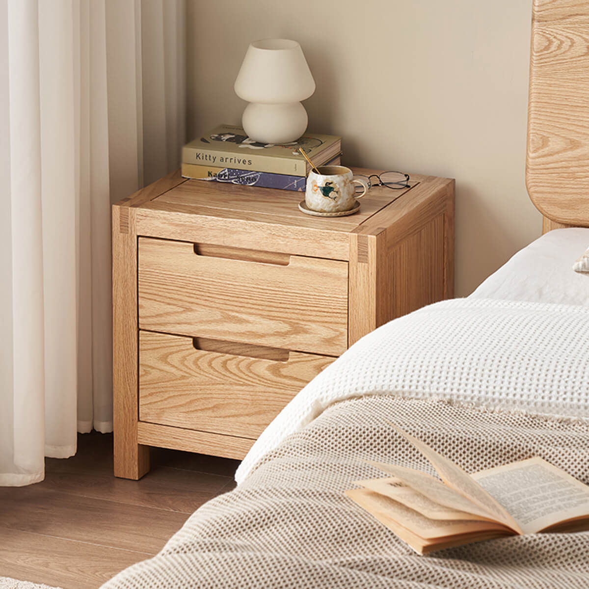 Norman Solid Oak Bedside Table styled in a modern bedroom