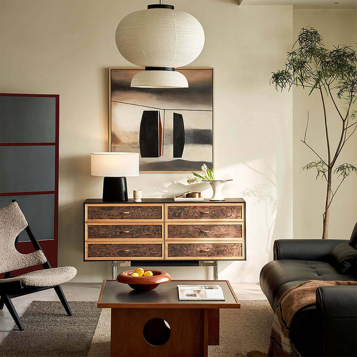 Orven burl-effect chest of drawers styled in a living room