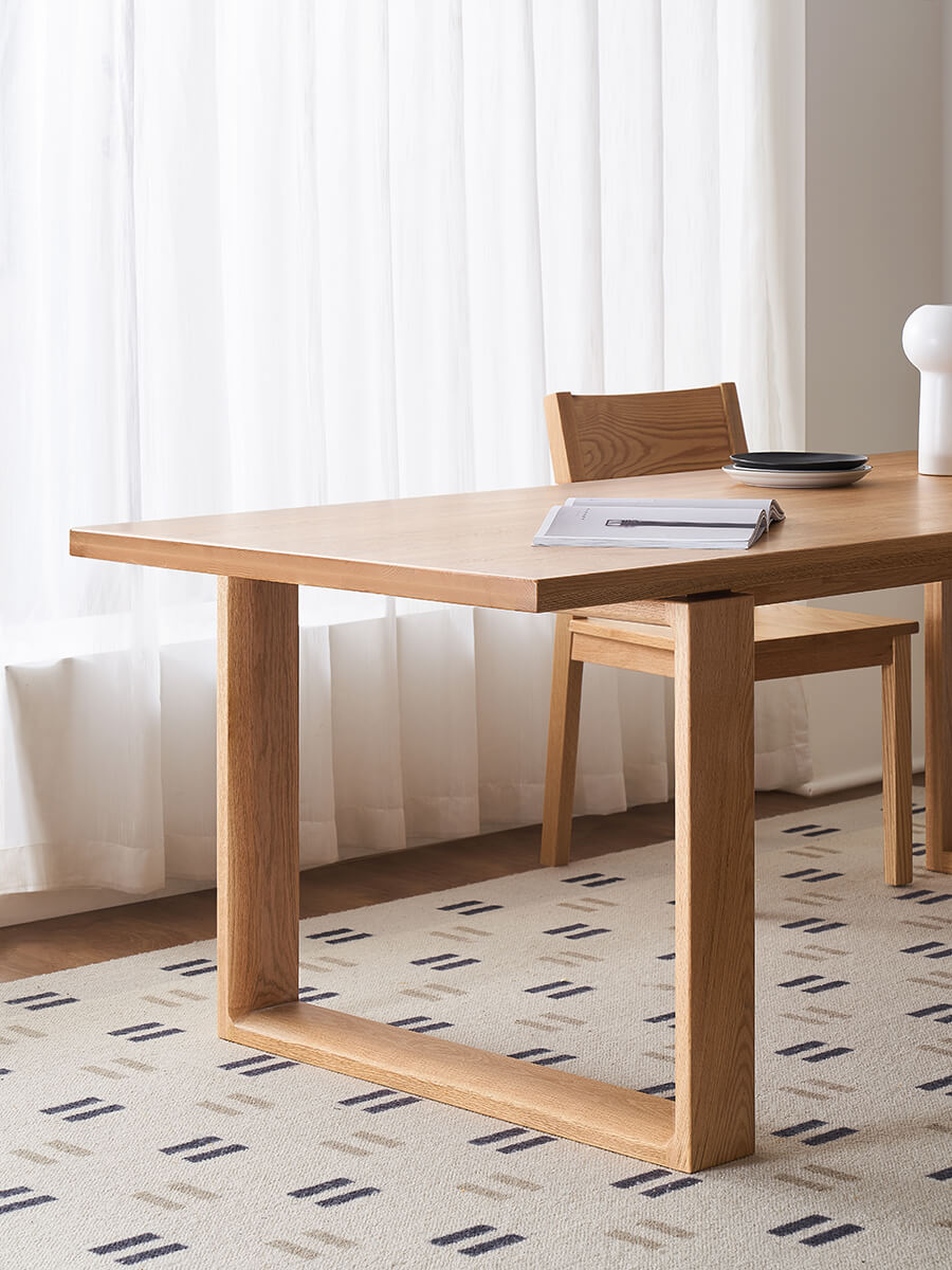Oscar Dining Table featuring solid oak U-shaped leg design