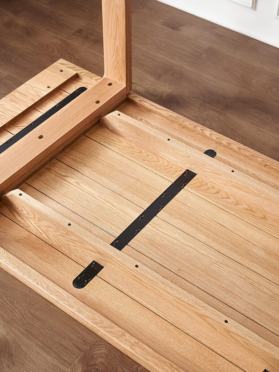 Steel reinforcement system beneath the Oscar Solid Oak Dining Table