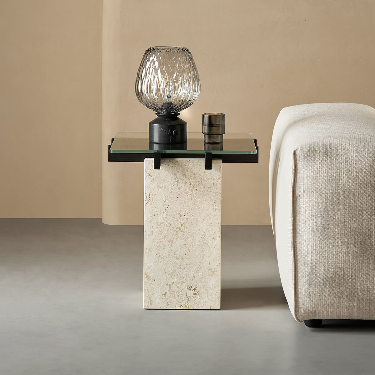 Patrick glass and marble side table in a modern reading corner