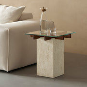 Patrick glass and marble side table beside a modern fabric sofa