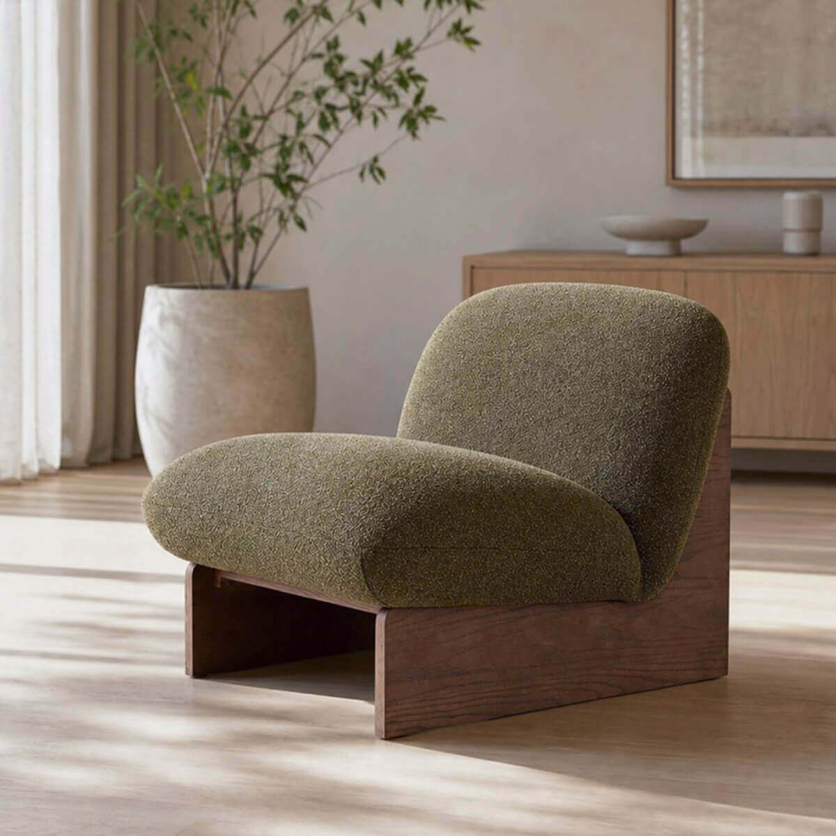 Pebble Accent Chair with sculptural timber base and upholstered seat